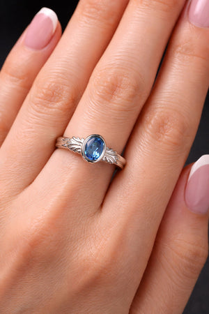 blue topaz sterling silver ring on model