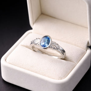 sculptural vintage inspired blue topaz silver ring
