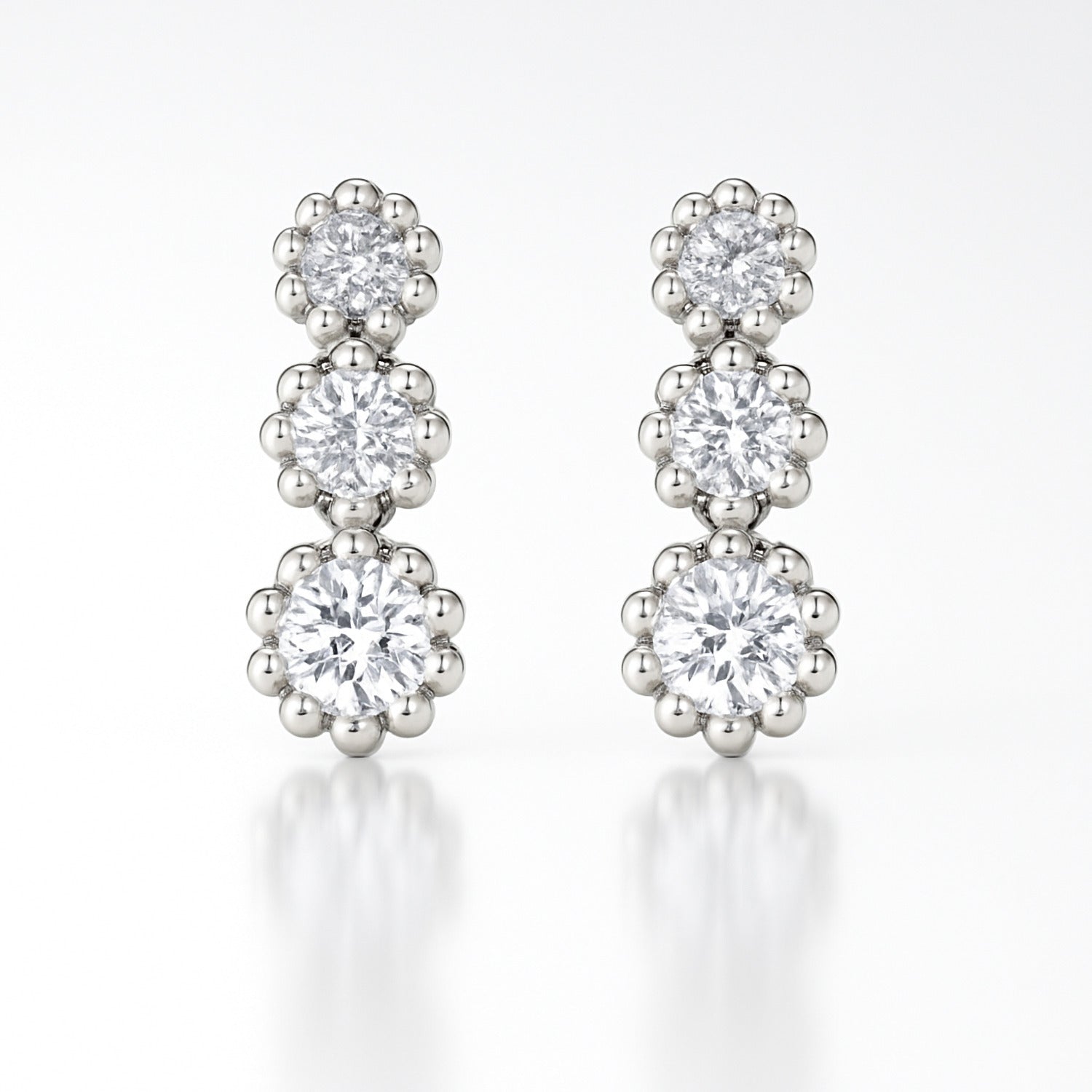 diamond studs three stone