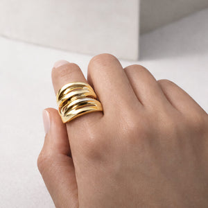 elegant gold statement ring with zebra cut-out design