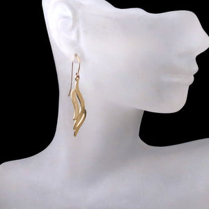 elegant gold wave dangle earrings sideview