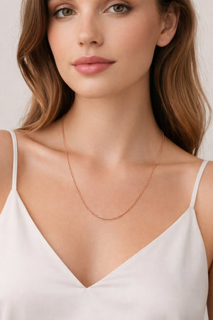 fine cable chain in solid 14K rose gold on model
