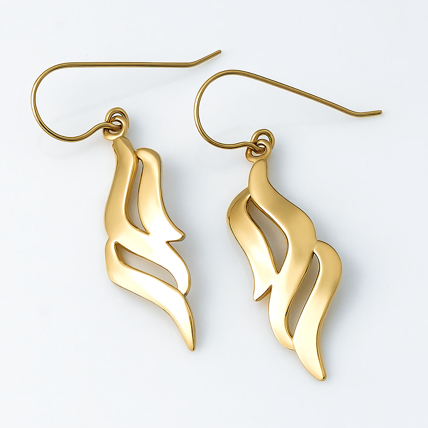 gold dangle earrings wave design modern elegant