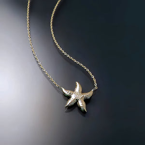 yellow gold starfish necklace