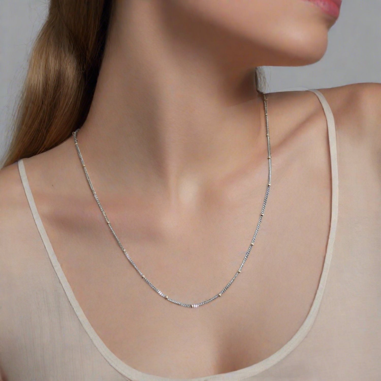 two tone gold station cable chain with beads