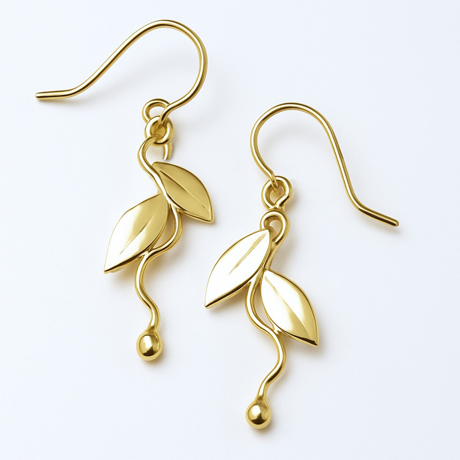 leaf design dangle earrings in 14K yellow gold