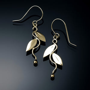 leaf design dangle earrings in yellow gold