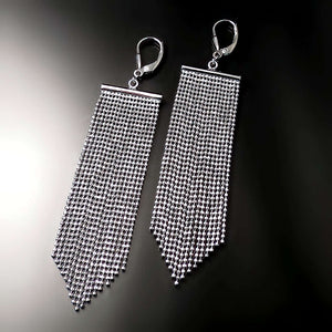 long silver tassel statement earrings