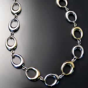 modern two tone gold necklace close up