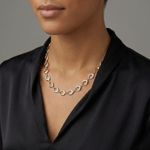 modern elegant two tone gold necklace on model