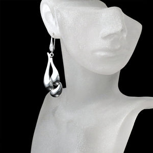 modern sculptural statement earrings silver