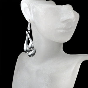 modern sculptural statement earrings