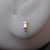 delicate diamond earrings in 14K gold