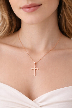 rose gold orthodox cross necklace on model