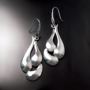 sculptural modern statement earrings silver