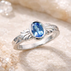 sculptural vintage inspired blue topaz silver ring