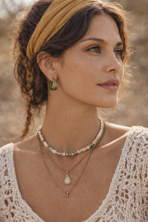 silver seasons eucalyptus leaf hoops earrings