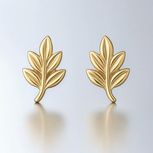 tiny leaf studs earrings yellow gold