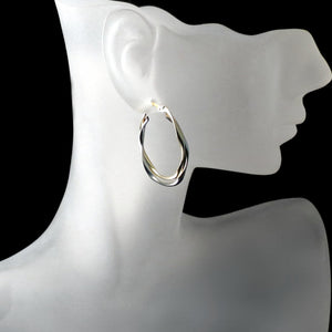 twisted hoop two tone gold earrings
