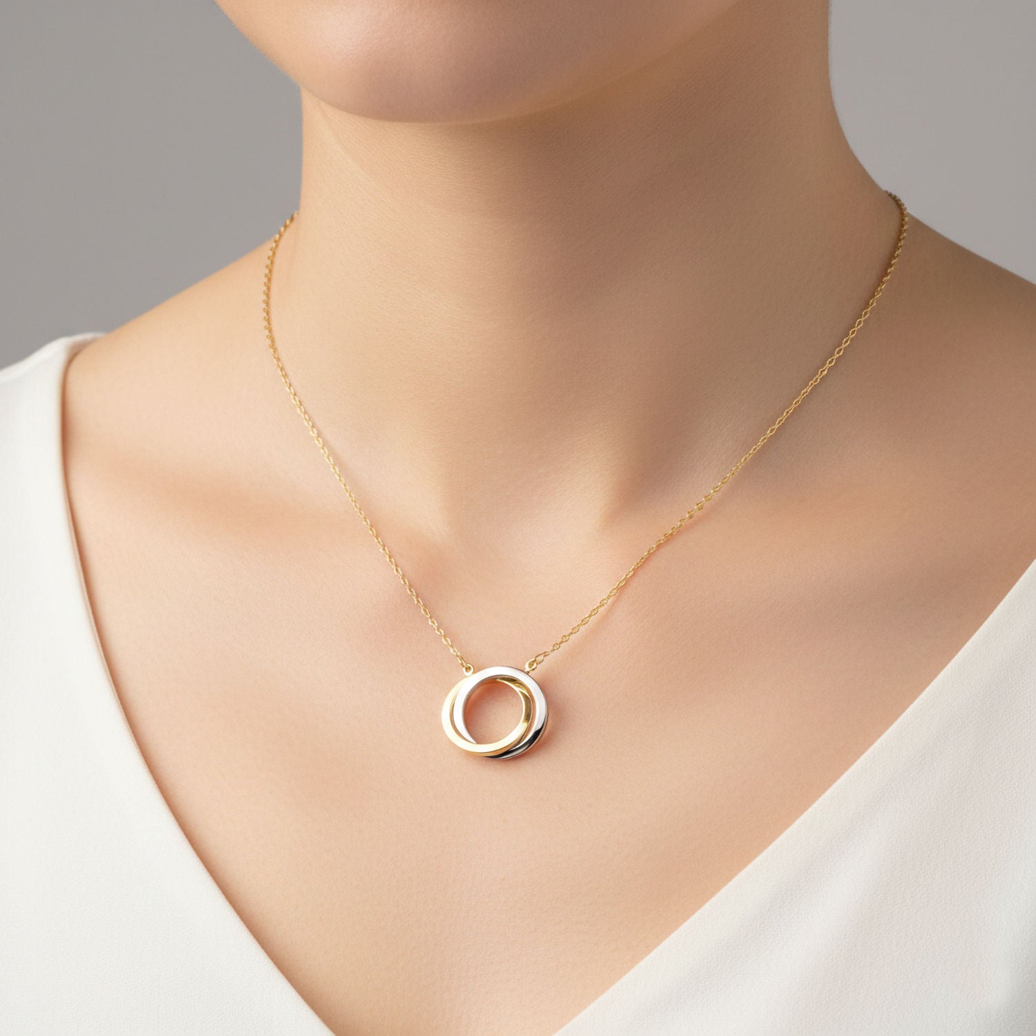 two tone gold intertwined circles necklace