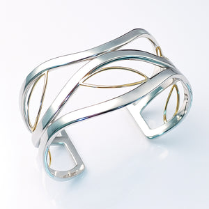 wide cuff statement bracelet two tone silver and gold