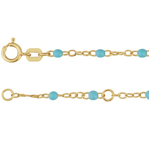 yellow gold station necklace with turquoise beads