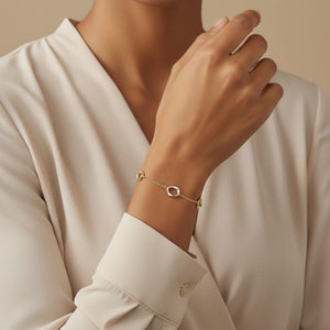 modern two tone gold station bracelet