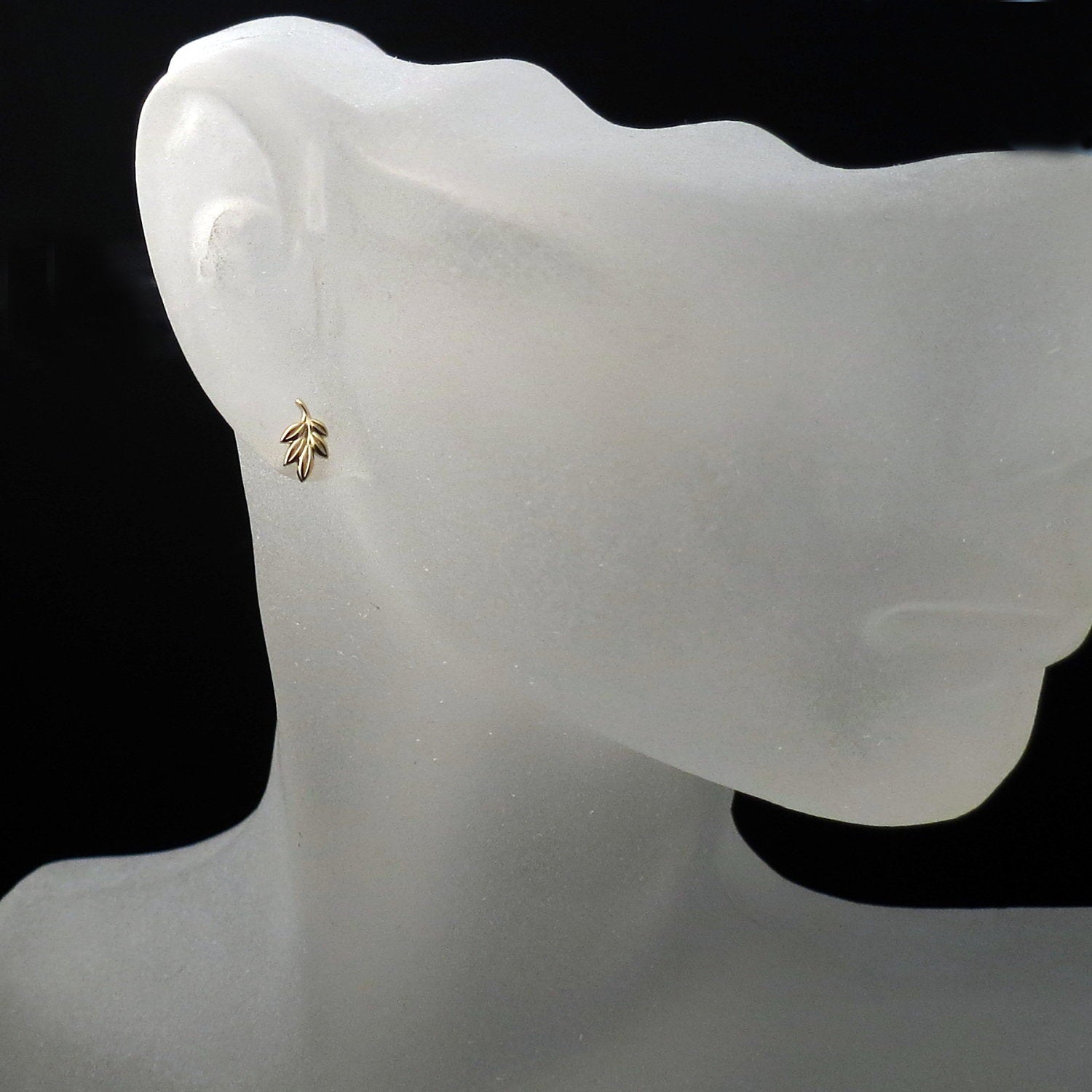tiny leaf studs earrings gold